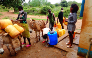 Users collecting water a kiosk in Kitui, Kenya. Credit: Mbogo Mwaniki